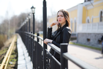 Fototapeta premium Girl on a walk through the spring city