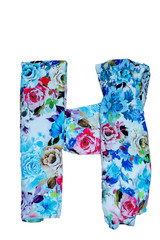       Isolated English flower alphabet is made of fabric with floral print