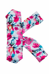       Isolated English flower alphabet is made of fabric with floral print