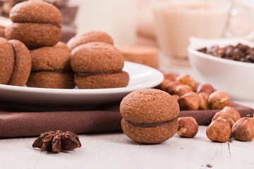 Hazelnut shortbread sandwiches filled with chocolate cream. 