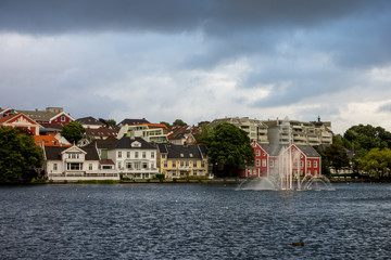 Buildings with waterworks near the Breiavatnet lake in Stavanger