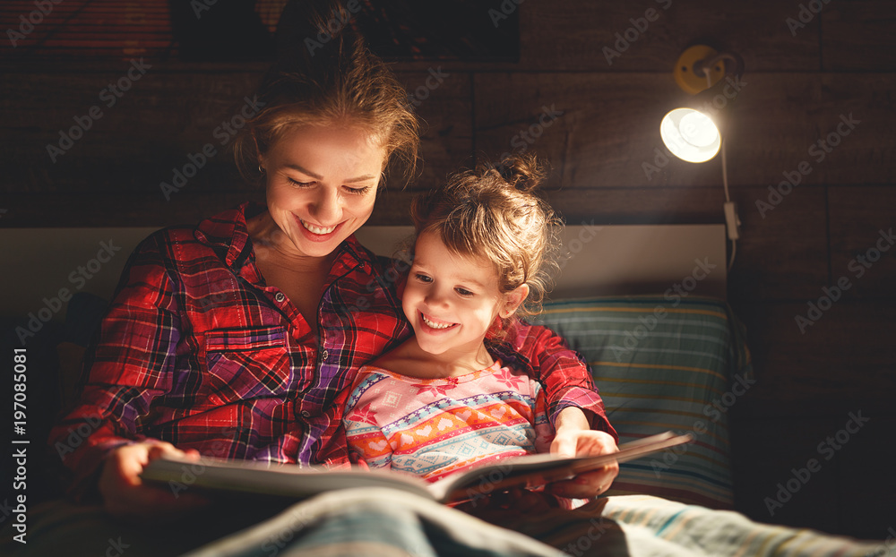 Sticker mother and child reading book in bed before going to sleep .