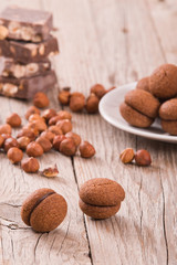 Hazelnut shortbread sandwiches filled with chocolate cream 