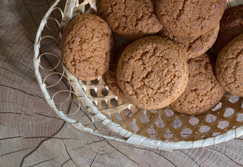 Oatmeal cookies on a wooden table, close-up.