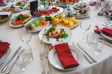 Table and food decorated for a party or wedding reception