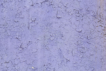 Abstract lilac texture background from old paint on plaster.