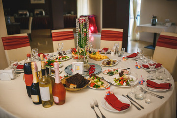 Interior Arrangement for wedding with flowers in burgundy colors