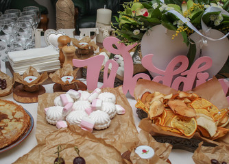 wedding table decorated with confectionery