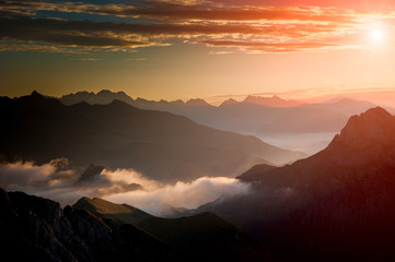 Dawn in the mountains with fog