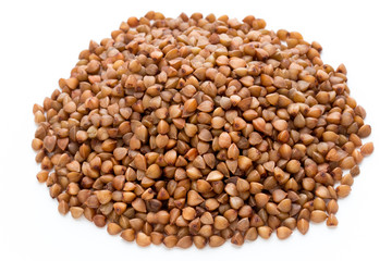 Buckwheat grains isolated on the white background.