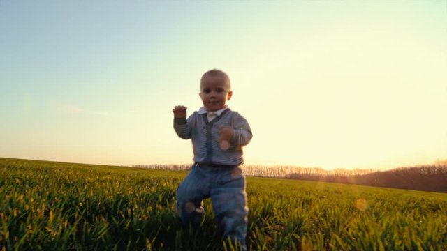 Boy is making his first steps