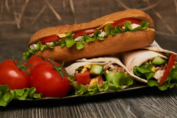 Burrito with grilled chicken and vegetables, Shawarma Sandwich, Doner Kebab, Chicken Shawarma, Subway sandwich on wooden table