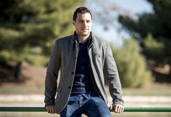 Fototapeta premium Male model posing in the park