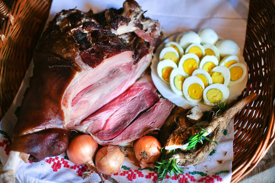 Easter Ham And Eggs. Traditional Breakfast. Close Up Shot Of Food In Wicker Basket.