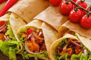 Mexican burrito with chicken, pepper and beans