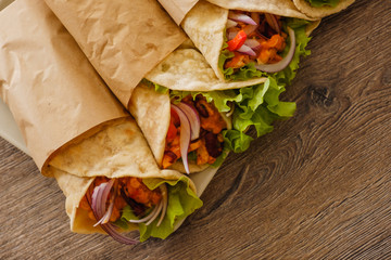 Mexican burrito with chicken, pepper and beans