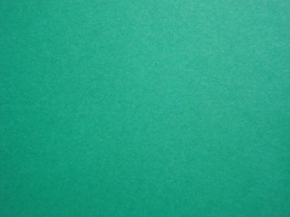 Green solid color paper background