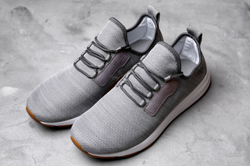 Stylish male shoes on grey background