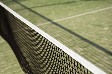 Fototapeta premium ball tennis on track with network and space for text