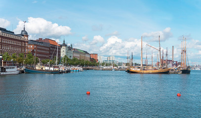 Fototapeta na wymiar Ships and yachts moored in the harbor, Helsinki, Finland