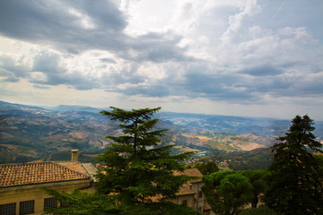 San Marino top view. Beautiful panoram of San Marino. Dark heavy sky, Italy.