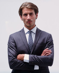thoughtful businessman adjusting his tie.