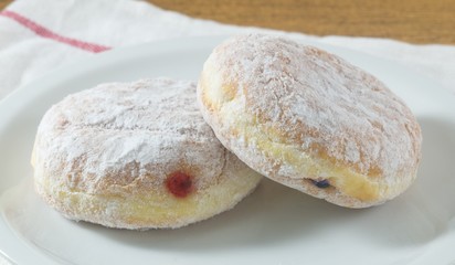 Two Delicious Donut Filled with Strawberry Jam