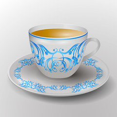 cup and saucer decorated with blue ornament. Vector