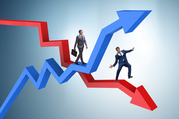 Opposite growth and decliine charts with businessman