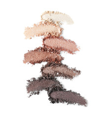 Crushed eye shadows on white background. Professional makeup products