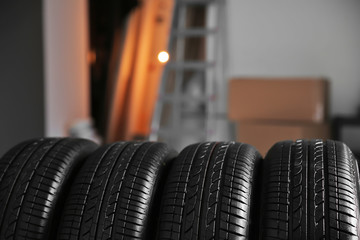 Obraz na płótnie Canvas Car tires in automobile service center