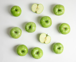 Fototapeta na wymiar Fresh green apples on white background, flat lay