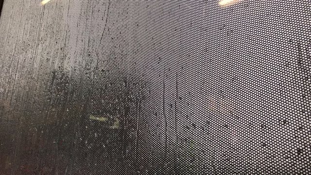 Rain droplet falling in the bus window.