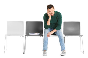 Young man waiting for job interview on white background