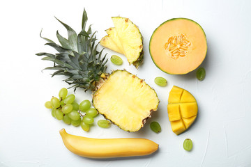 Set of fresh tropical fruits on white background