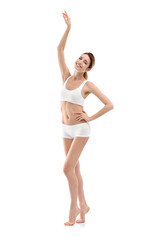 Young woman with beautiful slim body on white background