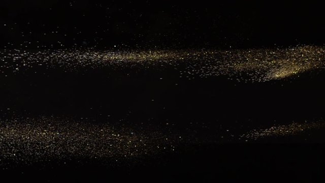 00:01 | 00:59 1&times;  Falling real golden dust from left to right, right to left on black background. This footage can be used on first plan of different videos by blend modes Overlay or Screen. Shot on R