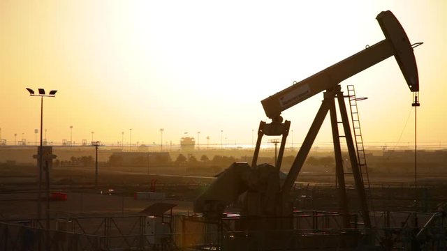 Oil Pump working at Sunset in Bahrain