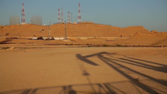 Oil Pumps Shadows at Sunset