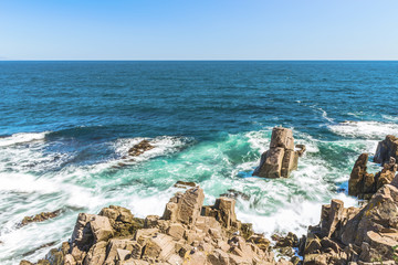 Rocks formation in the blue sea looks like a face in Sozopol, Bulgaria.