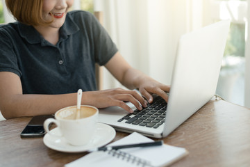 a cup of coffee latte has drank on wooden table