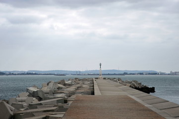 Fototapeta na wymiar A pier in the sea bay of Cadiz.