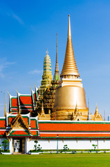 Naklejka premium Wat Phra Kaeo, Temple of the Emerald Buddha and the home of the Thai King. Wat Phra Kaeo is one of Bangkok's most famous tourist sites and it was built in 1782 at Bangkok, Thailand.