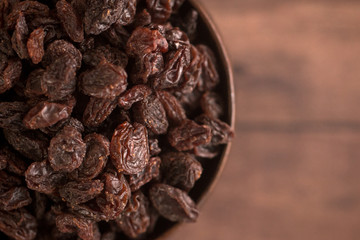 Raisins in a Wooden Bowl