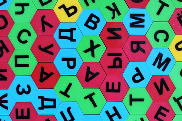 Children's colored mosaic with Russian letters, top view
