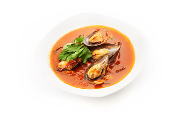 Mussel soup on white background