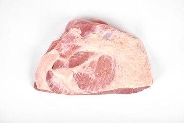 A large piece of pork isolated on white
