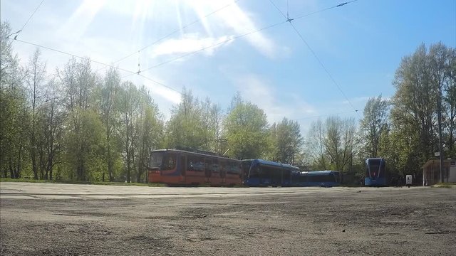 trams and people at the last stop in summer timelapse
