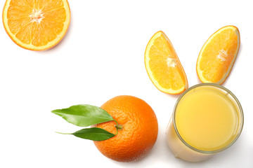 orange juice with sliced orange and green leaf isolated on white background. top view with copy space