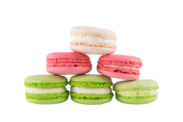 6 macaron cookies of different colors, on white background
